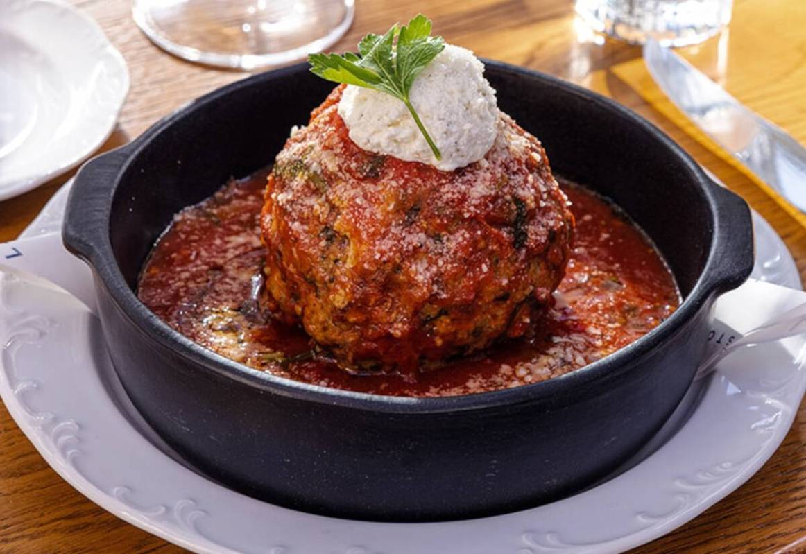 The Meatball, an oversized mix of wagyu, sausage and lamb, a signature dish at Lavo, which is r ...