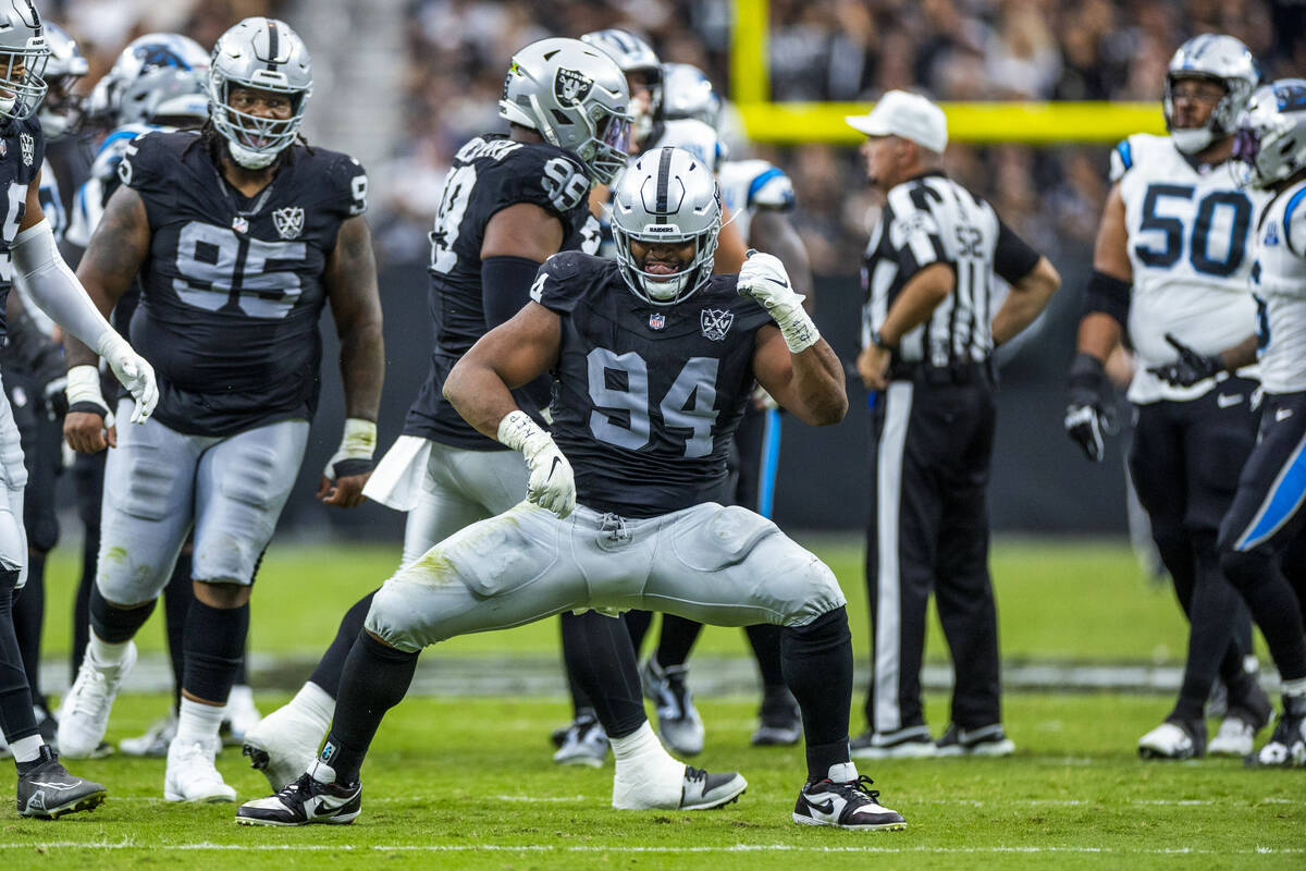 Raiders defensive tackle Christian Wilkins (94) celebrates a big play against the Carolina Pant ...