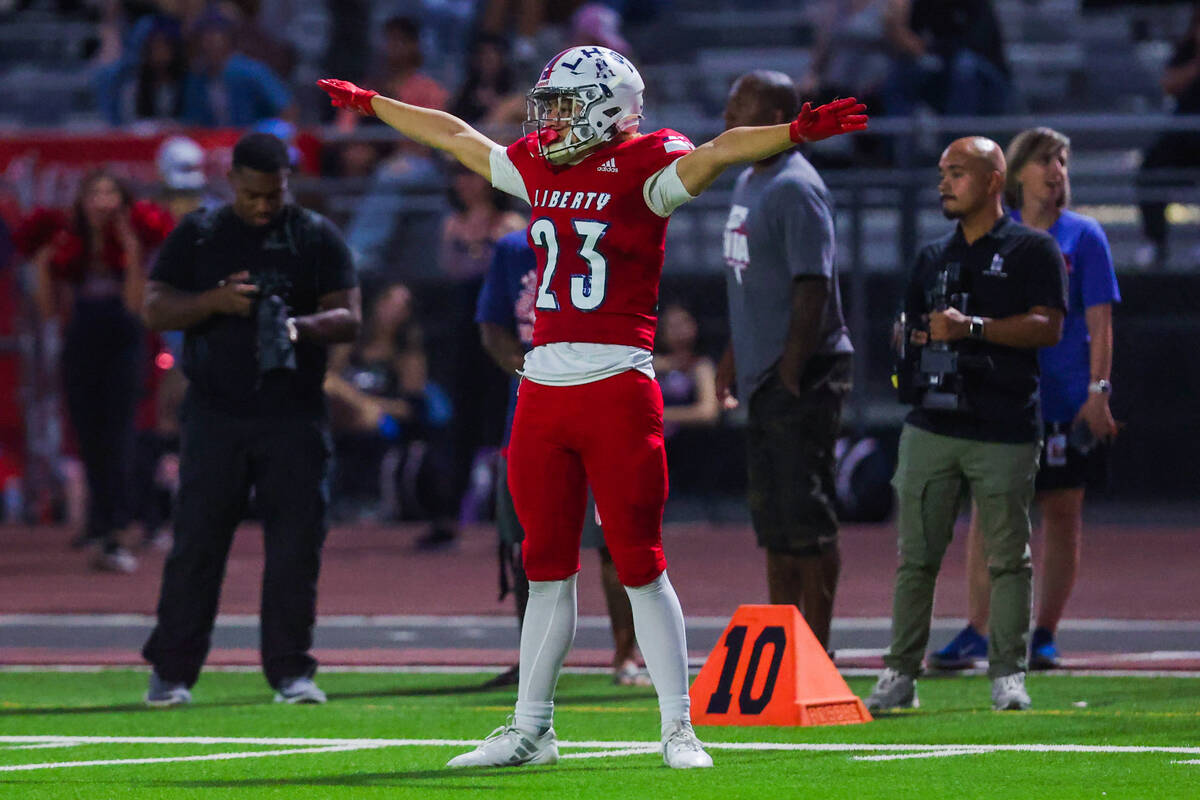 Liberty defensive back Seleva’atielu Alofipo (23) celebrates forcing an incomplete pass ...