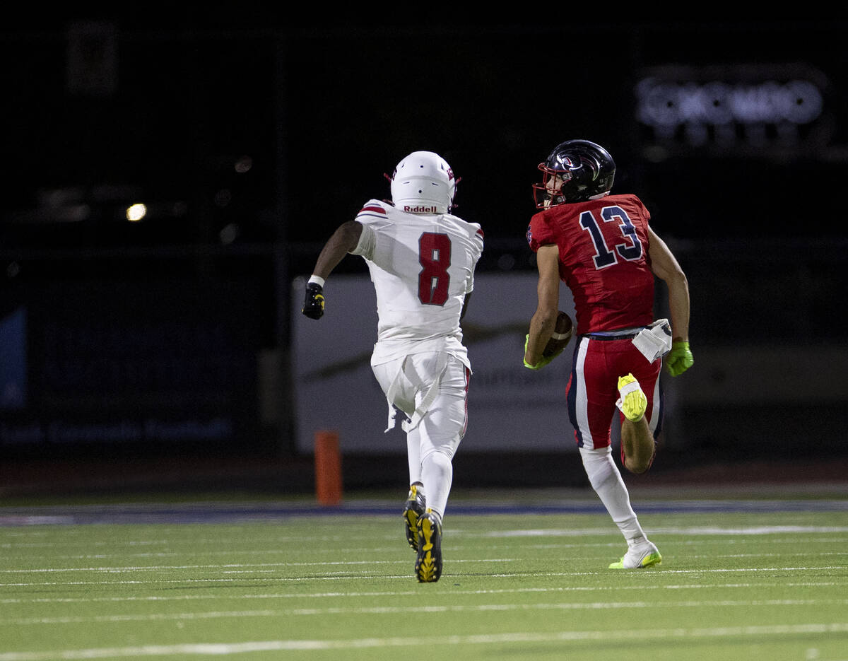 Coronado wide receiver Scott "Bubba" Holper (13) looks back one more time before scor ...