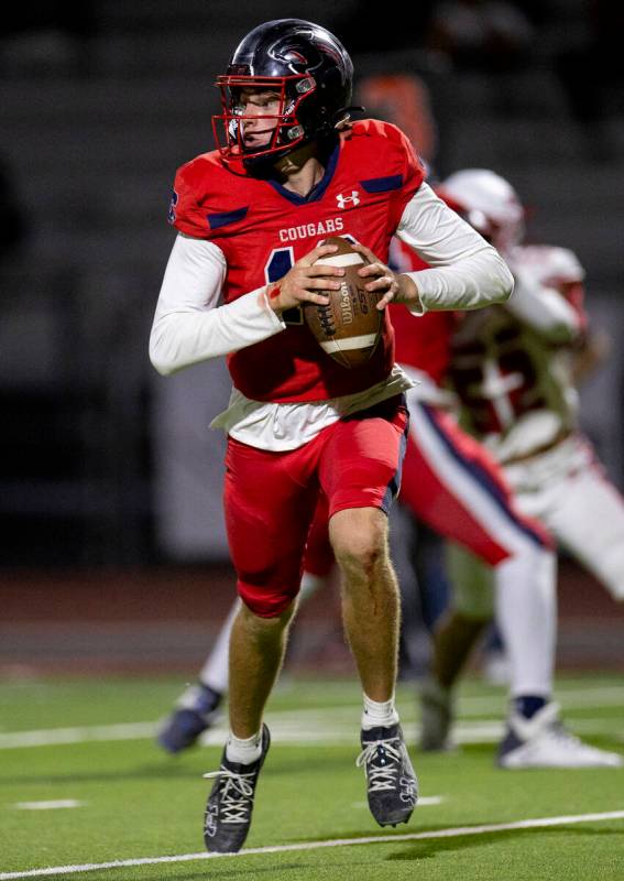 Coronado quarterback Aiden Krause (10) looks for a receiver during the high school football gam ...