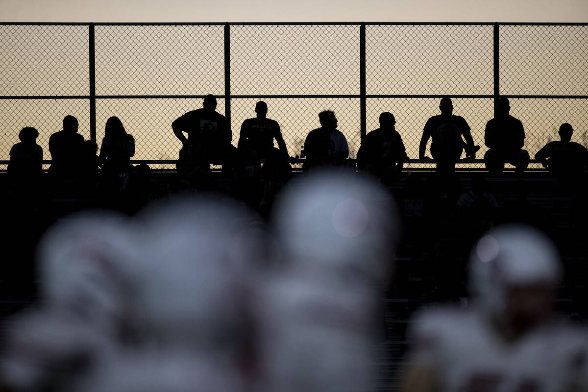 Arbor View fans watch the high school football game against Coronado as the sun sets at Coronad ...