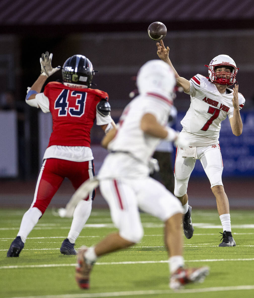 Arbor View quarterback Thaddeus Thatcher (7) throws the ball during the high school football ga ...