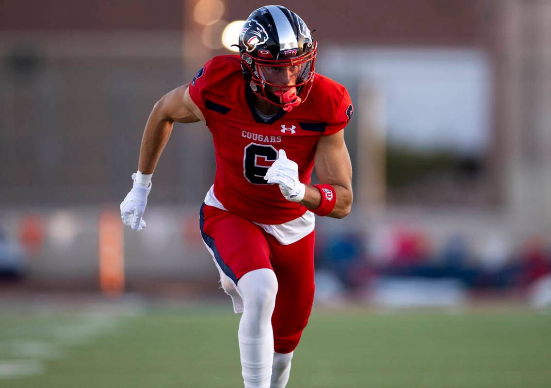 Coronado senior JJ Buchanan (6) runs down the field during the high school football game agains ...