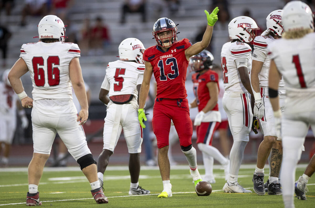 Coronado wide receiver Scott "Bubba" Holper (13) points after making a first down dur ...