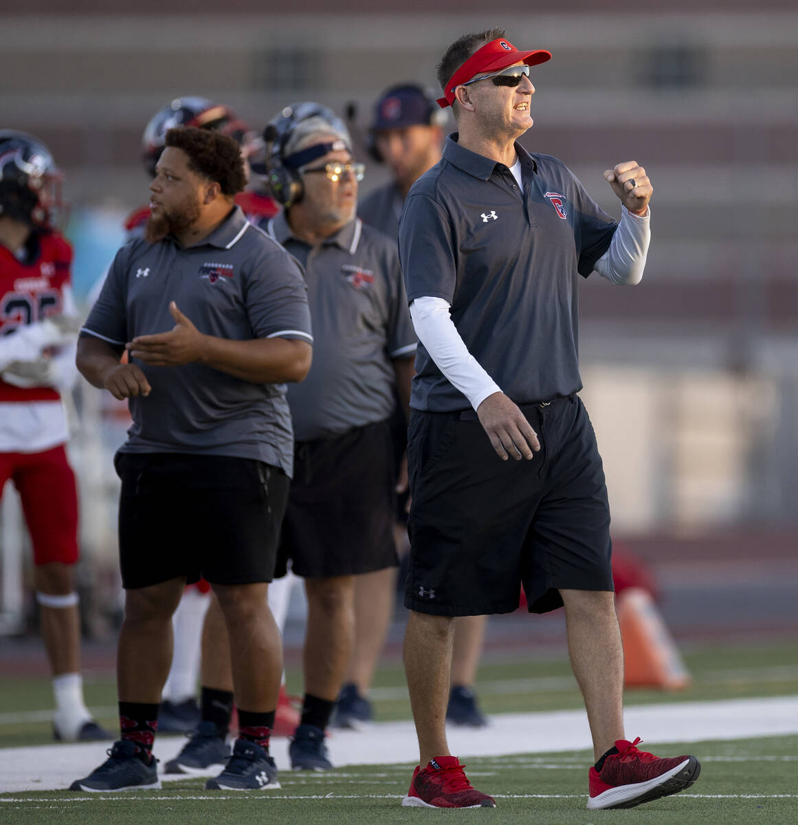 Coronado Head Coach Shawn Dupris yells a play during the high school football game against Arbo ...