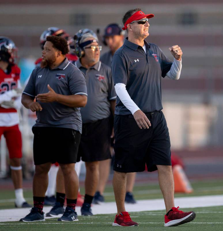 Coronado Head Coach Shawn Dupris yells a play during the high school football game against Arbo ...