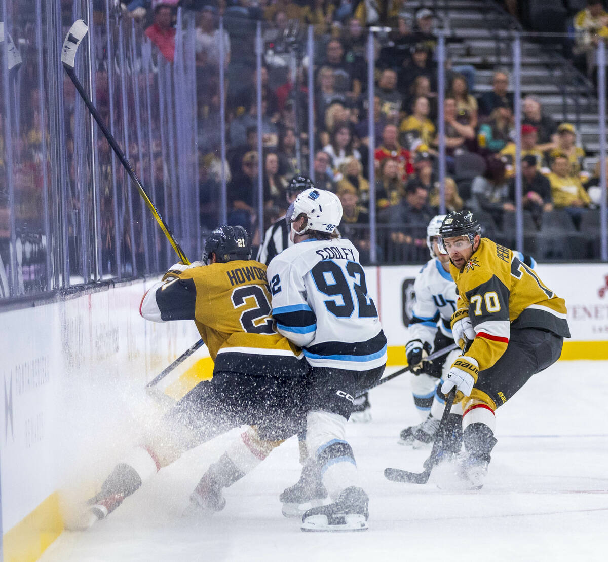 Golden Knights forward Tanner Pearson (70) looks for the puck after a collision from Utah Hocke ...