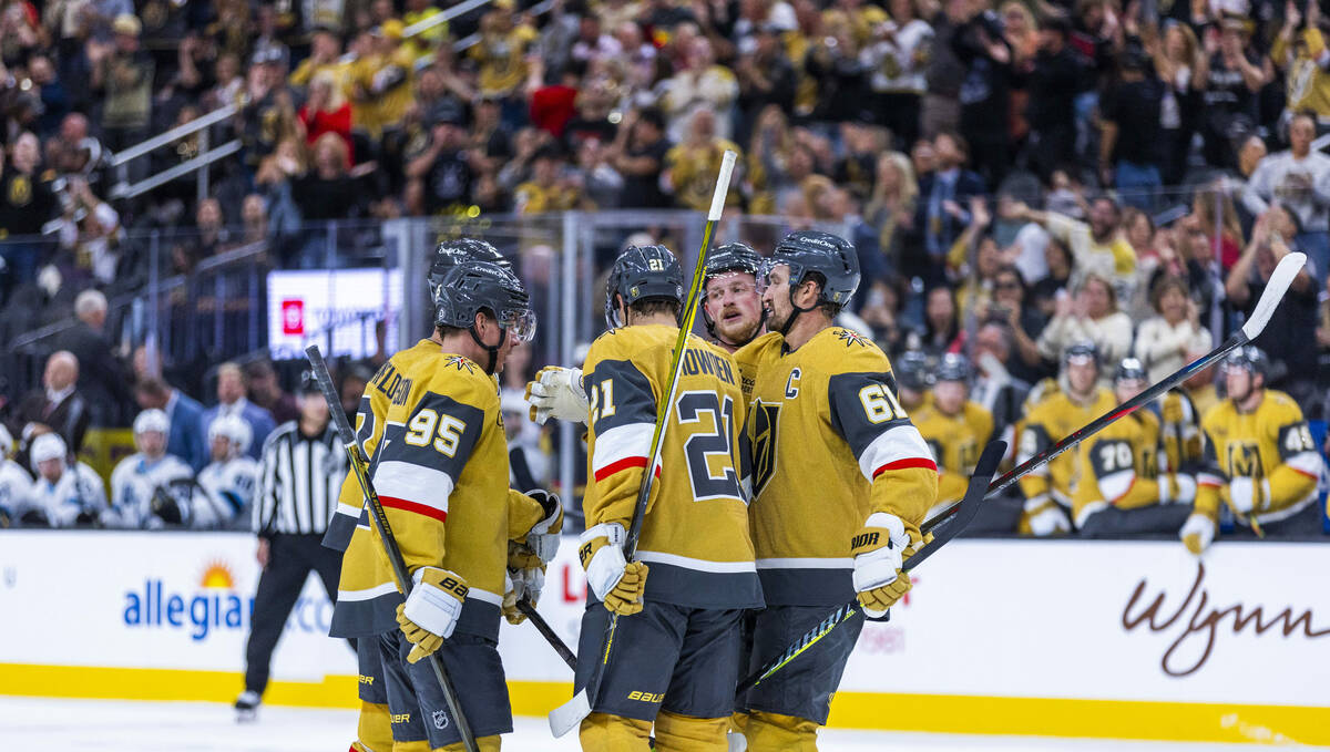 Golden Knights right wing Mark Stone (61) and teammates celebrate a score against Utah Hockey C ...