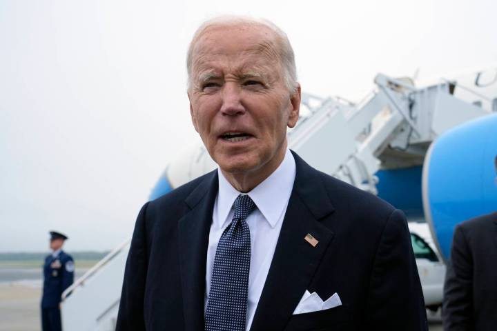 President Joe Biden speaks the the media after stepping off Air Force One at Dover Air Force Ba ...