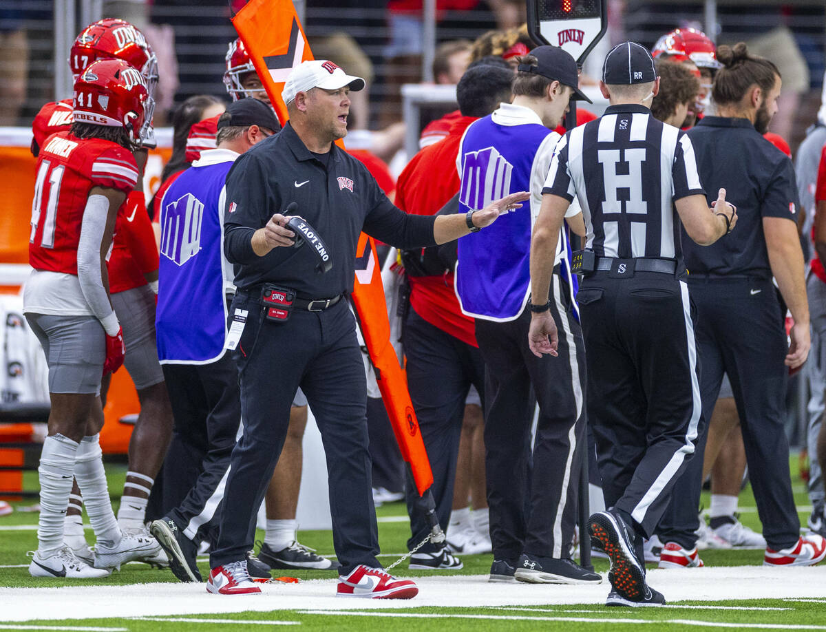 UNLV Head Coach Barry Odom has concerns for an official as they dominate the Fresno State Bulld ...