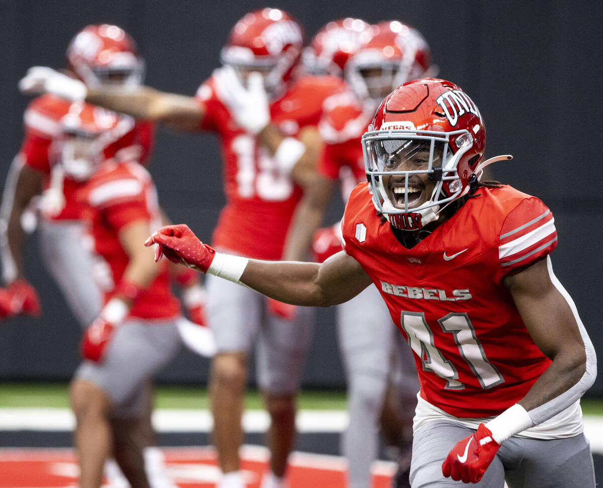 UNLV defensive back Rashod Tanner (41) runs back to the sideline after blocking a punt and scor ...