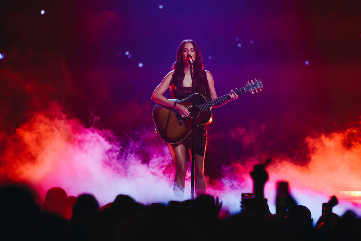 Kacey Musgraves performs during her Deeper Well tour stop at T-Mobile Arena on Saturday, Sept. ...