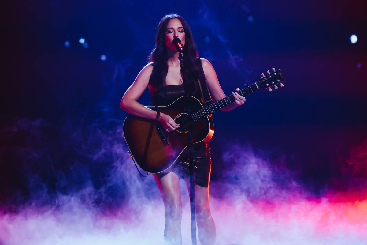 Kacey Musgraves performs during her Deeper Well tour stop at T-Mobile Arena on Saturday, Sept. ...