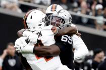 Raiders defensive tackle Adam Butler (69) sacks Cleveland Browns quarterback Deshaun Watson (4) ...