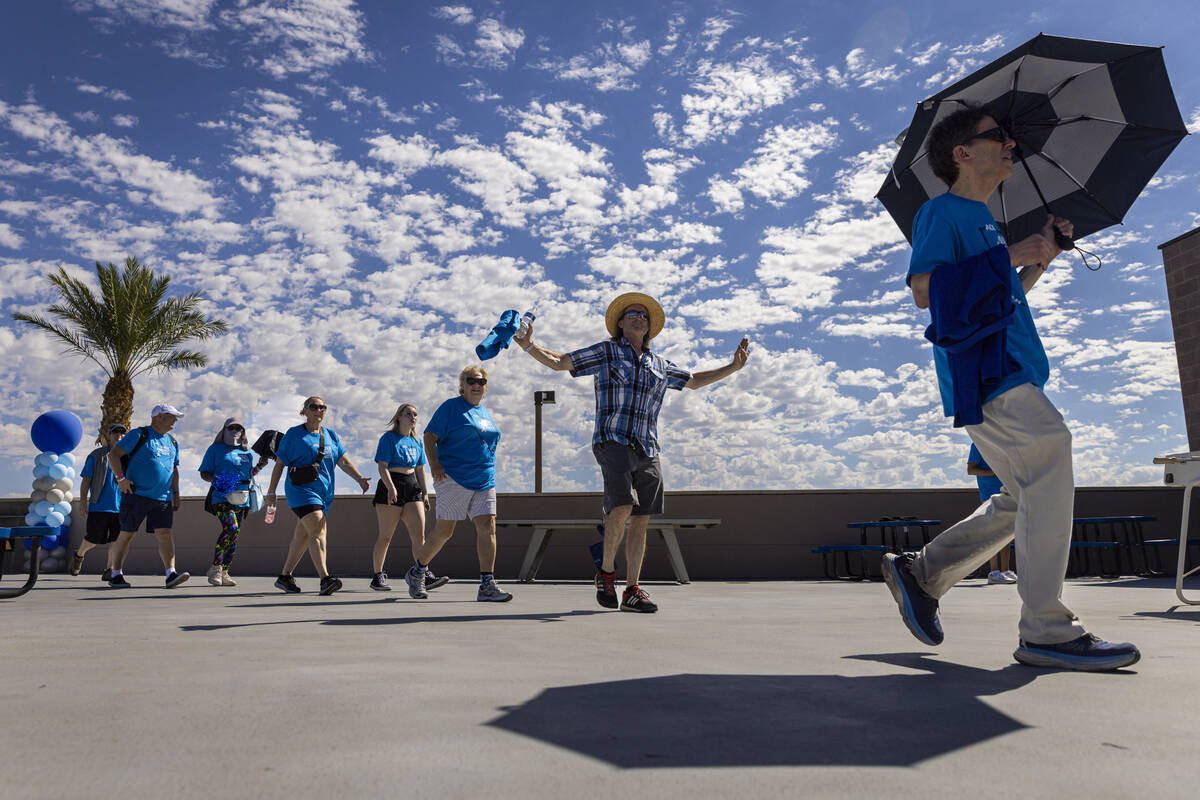 People participate in the Anti-Defamation League's Walk Against Hate at Las Vegas Ballpark in D ...