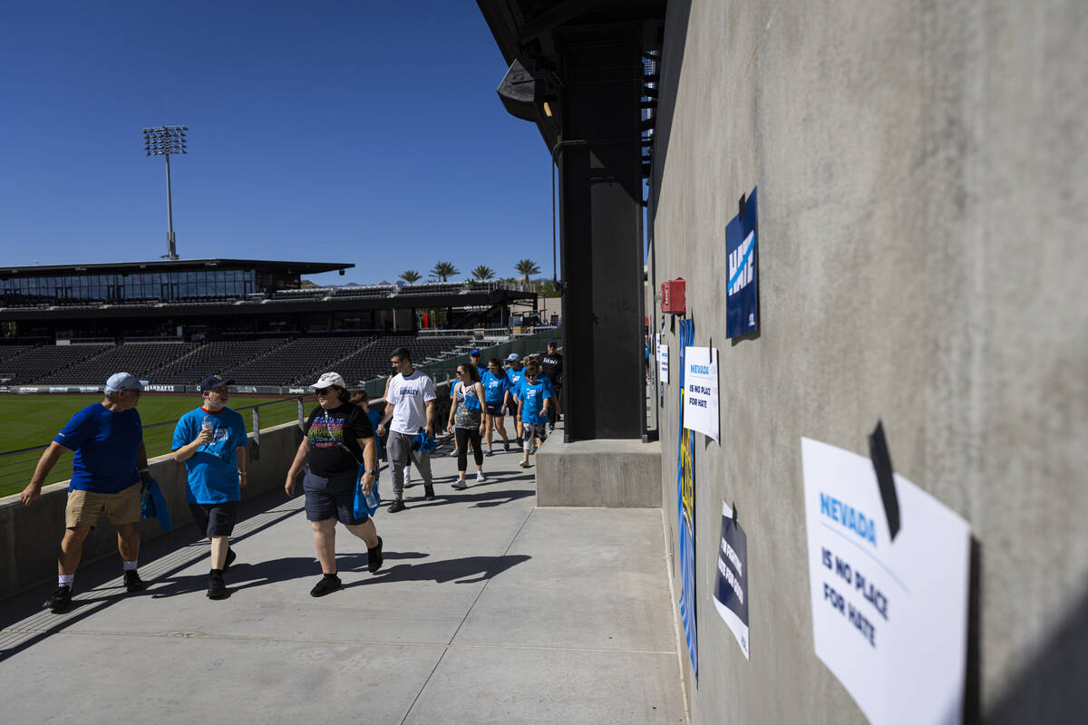 People participate in the Anti-Defamation League's Walk Against Hate at Las Vegas Ballpark in D ...