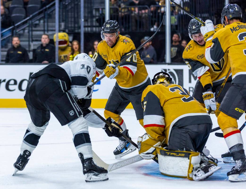 Golden Knights forward Tanner Pearson (70) charges in to defend Golden Knights goaltender Ilya ...