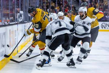 Golden Knights forward Tanner Pearson (70) against Los Angeles Kings defenseman Kyle Burroughs ...