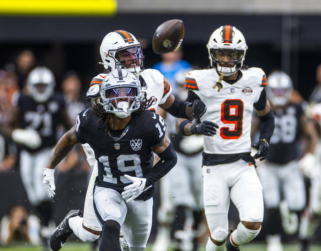 Raiders wide receiver DJ Turner (19) eyes a long pass as Cleveland Browns defenders trail durin ...