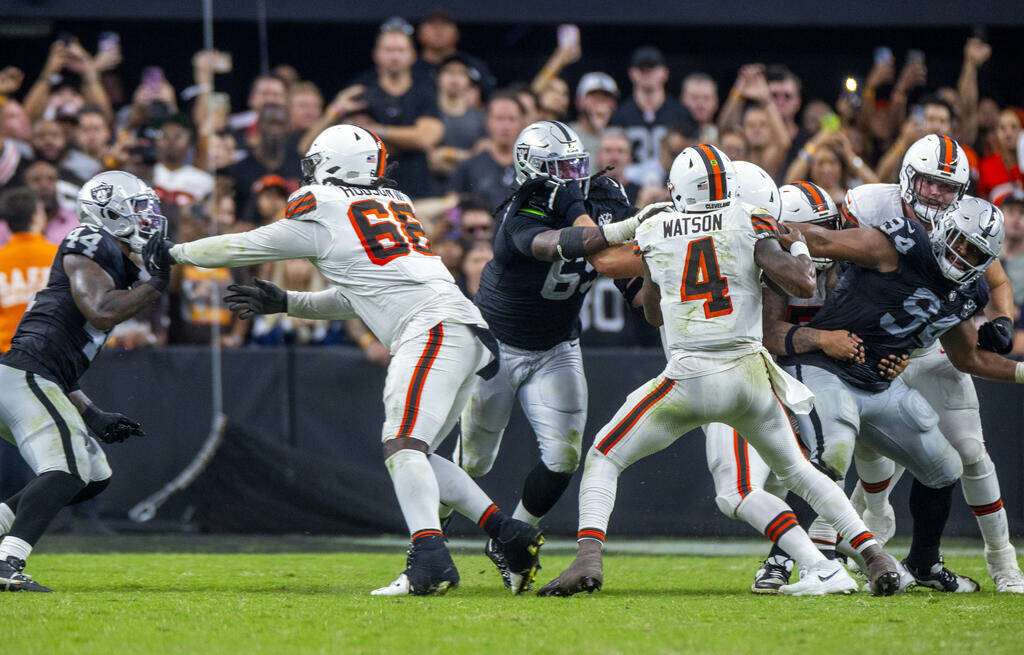 Cleveland Browns quarterback Deshaun Watson (4) is flushed from the pocked by defensive tackle ...