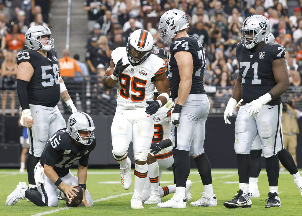 Cleveland Browns defensive end Myles Garrett (95) reacts after sacking Raiders quarterback Gard ...