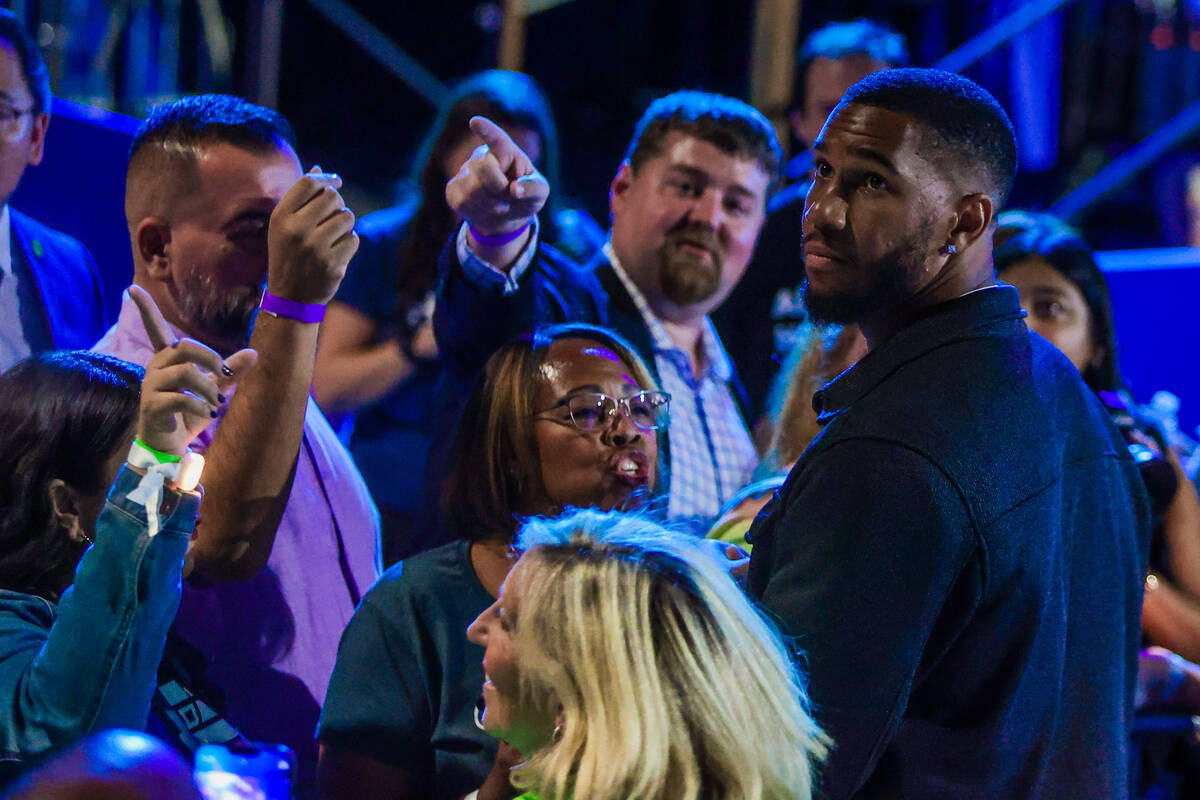 Raiders defensive end Charles Snowden is seen during a campaign event for Democratic presidenti ...