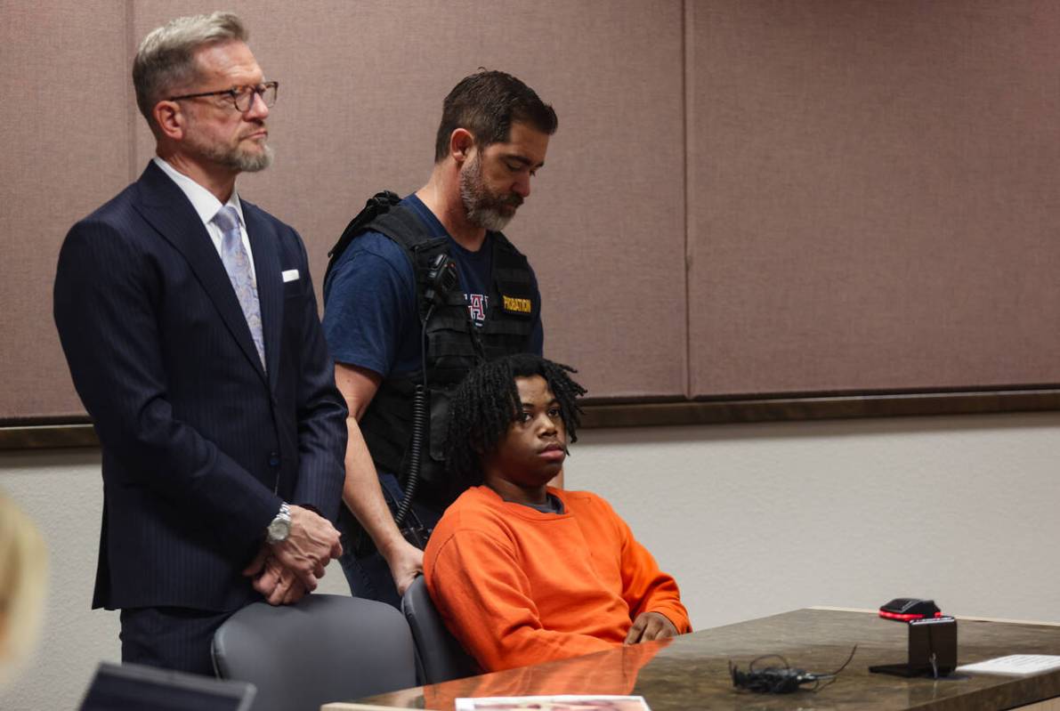 Gianni Robinson, one of the Rancho High School teens who beat Jonathan Lewis to death, sits nex ...