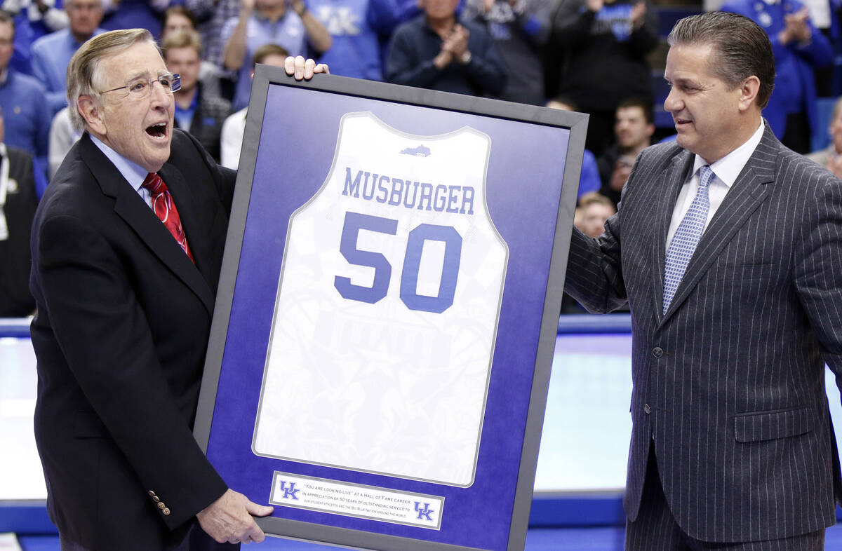 FILE - In this Jan. 31, 2017, file photo, veteran broadcaster Brent Musburger, left, is presen ...