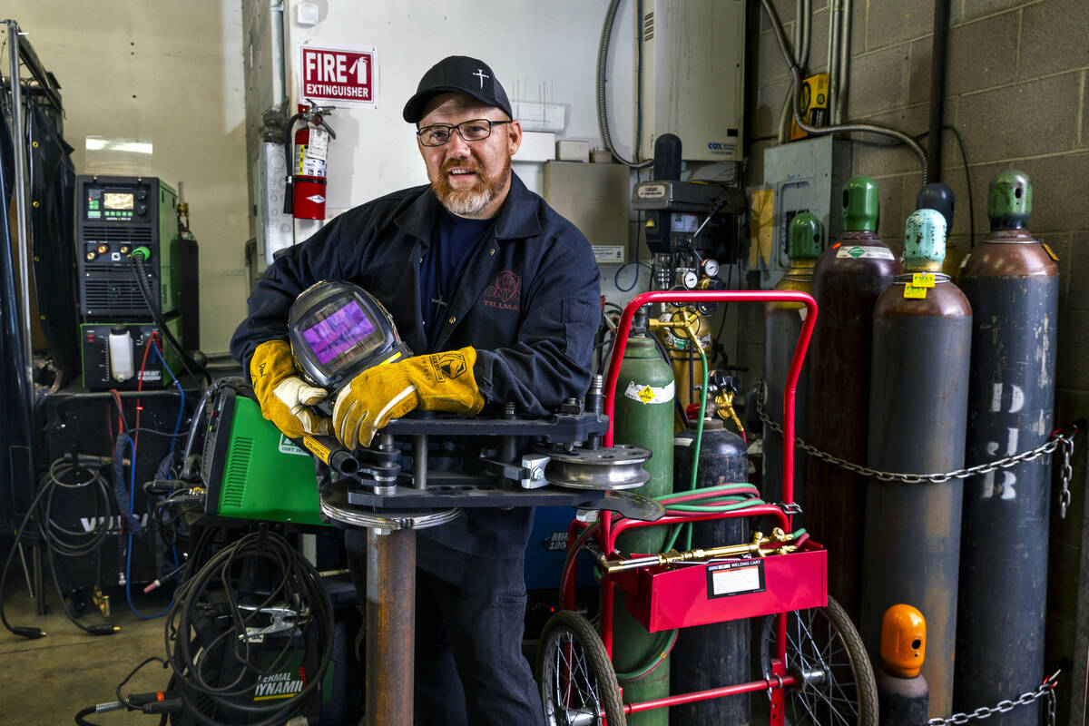 Greg Gilbert stands amongst some of his welding equipment and is the founder of the Welding Sch ...