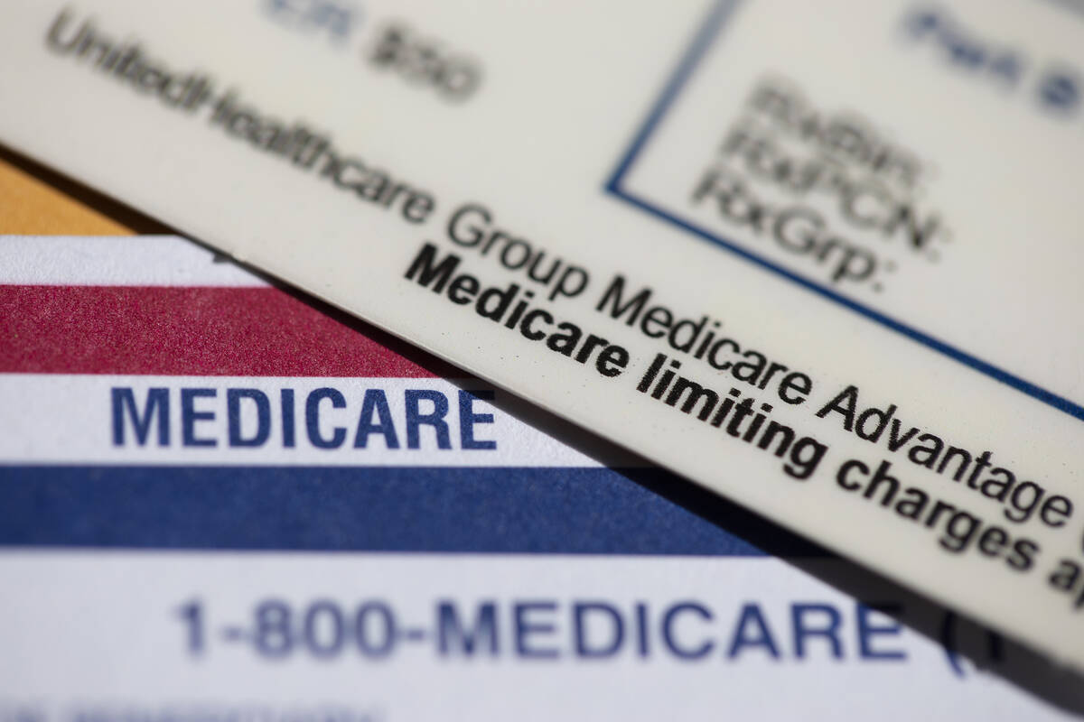 Medicare Advantage PPO card rests on top of a Medicare card. The annual enrollment period runs ...