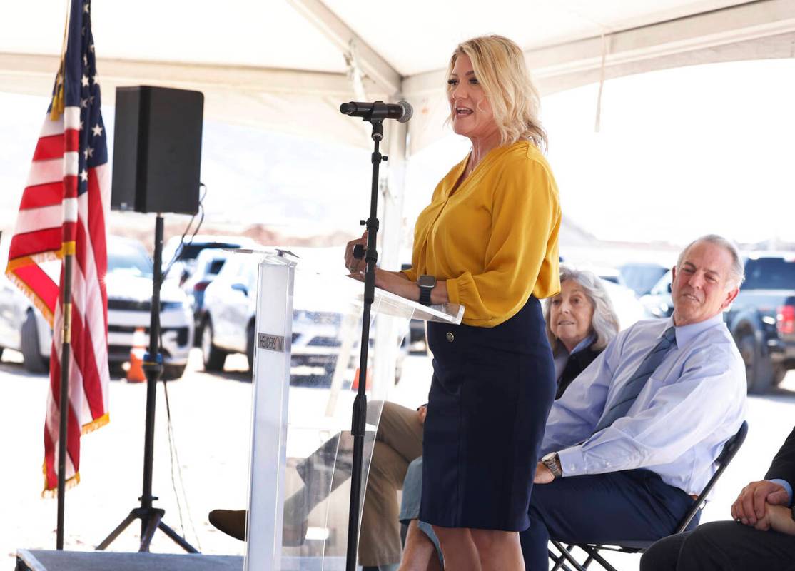 Henderson Mayor Michelle Romero speaks as Gov. Joe Lombardo and Dina Titus look on before parti ...