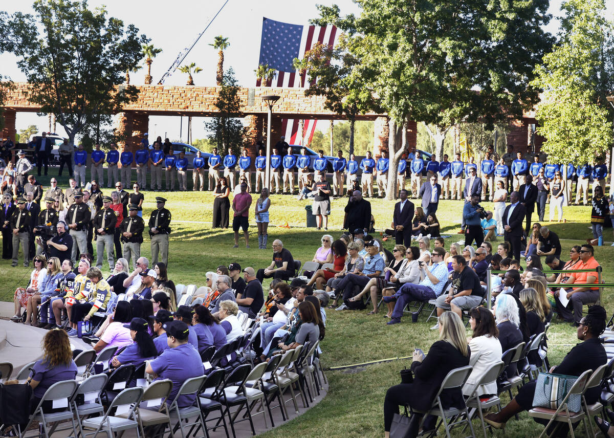 People attend the 1 October Sunrise Remembrance ceremony at the Clark County Government Center ...