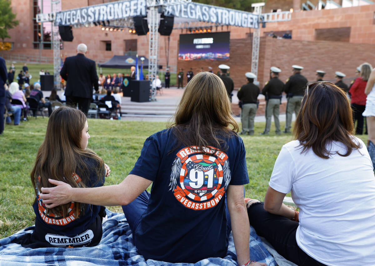 Brynn Sager, 12, left, and her mother Joy attend the 1 October Sunrise Remembrance ceremony at ...