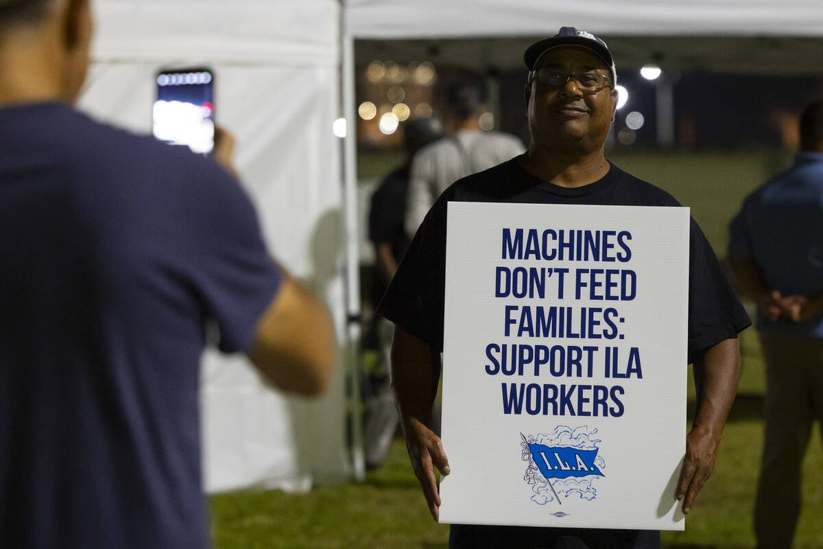 Longshoremen strike at midnight at Bayport Terminal on Tuesday, Oct. 1, 2024, in Houston. (AP P ...