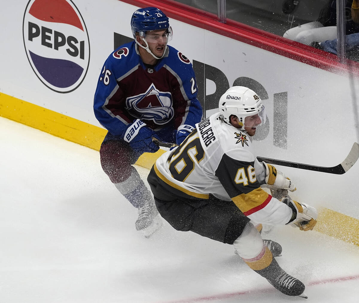 Vegas Golden Knights right wing Jonas Rondbjerg, front, pursues the puck with Colorado Avalanch ...