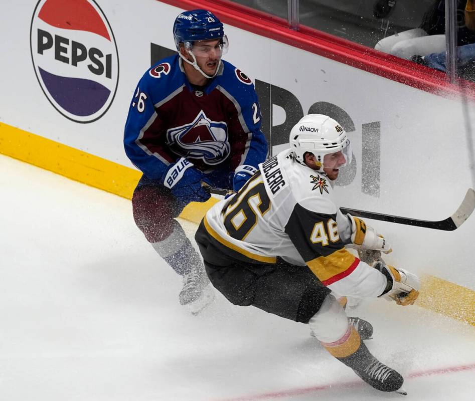 Vegas Golden Knights right wing Jonas Rondbjerg, front, pursues the puck with Colorado Avalanch ...