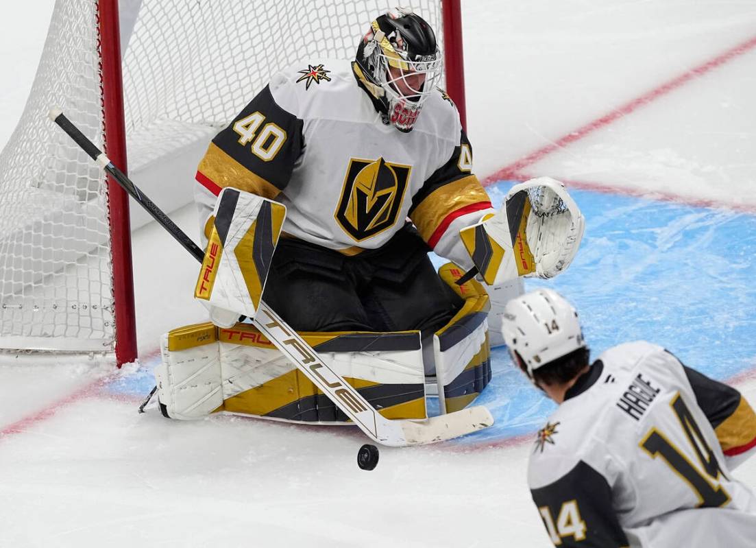 Vegas Golden Knights goalie Akira Schmid makes a stick save against the Colorado Avalanche in t ...