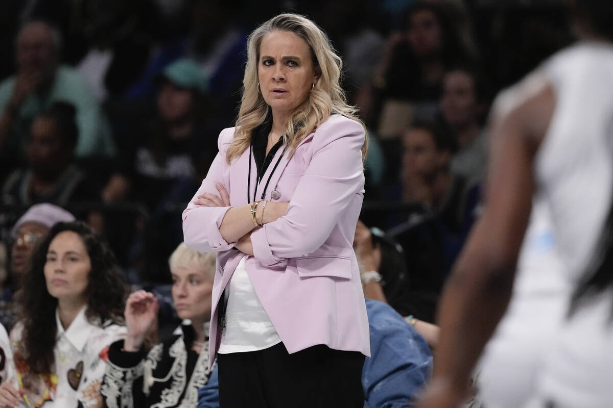 Las Vegas Aces head coach Becky Hammon watches during the first half of a WNBA basketball semif ...