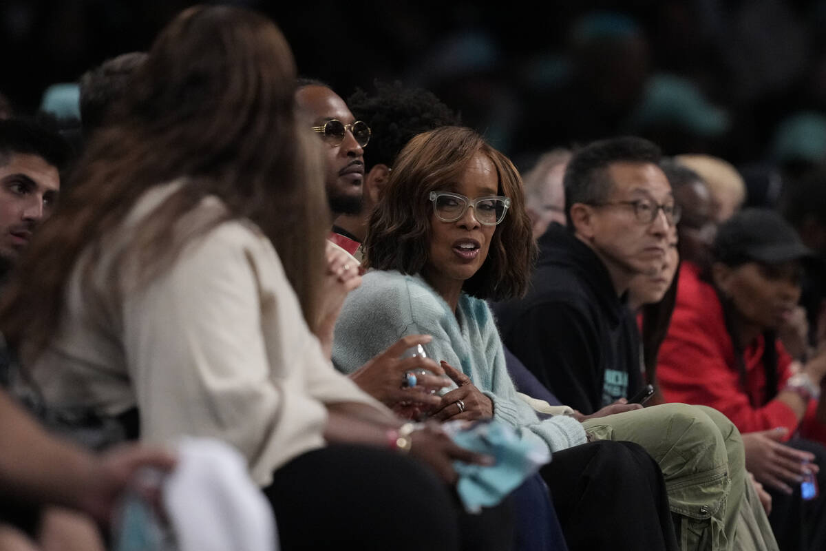 Gayle King watches during the first half of a WNBA basketball semifinal game between the New Yo ...