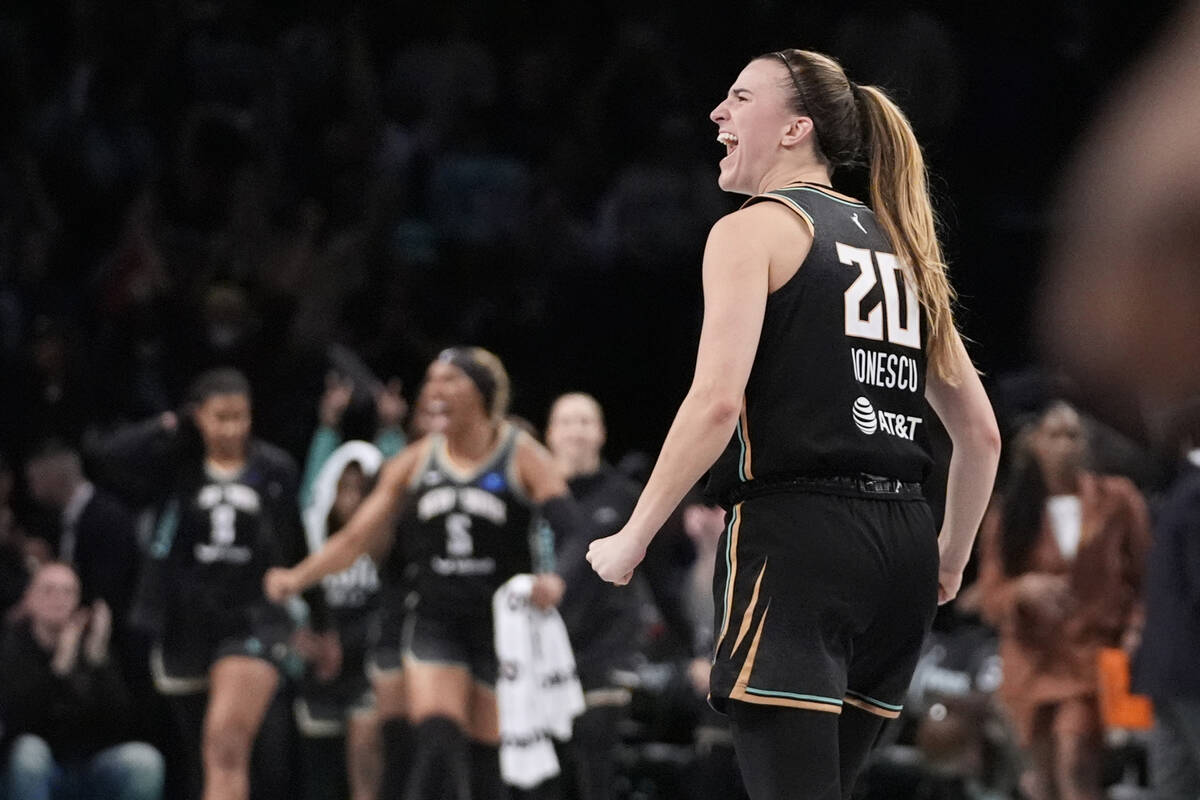 New York Liberty's Sabrina Ionescu (20) celebrates after a WNBA basketball semifinal game again ...