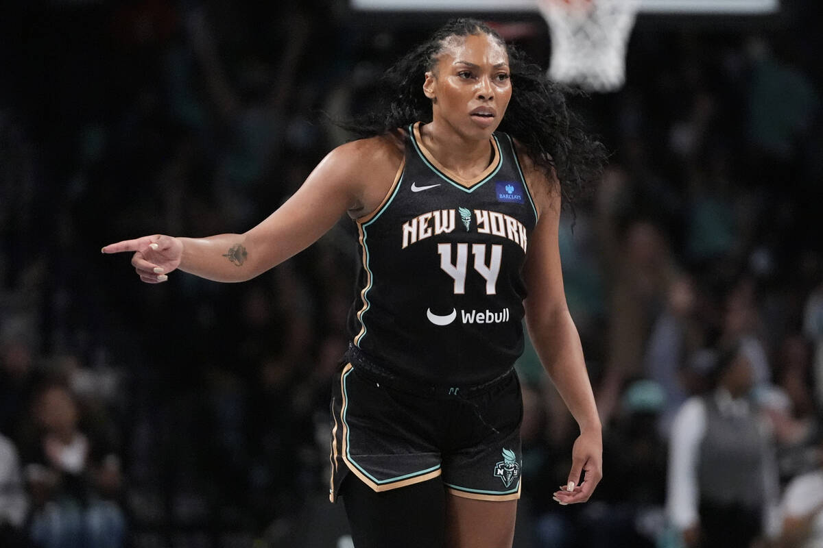 New York Liberty's Betnijah Laney-Hamilton (44) gestures to teammates after making a three-poin ...