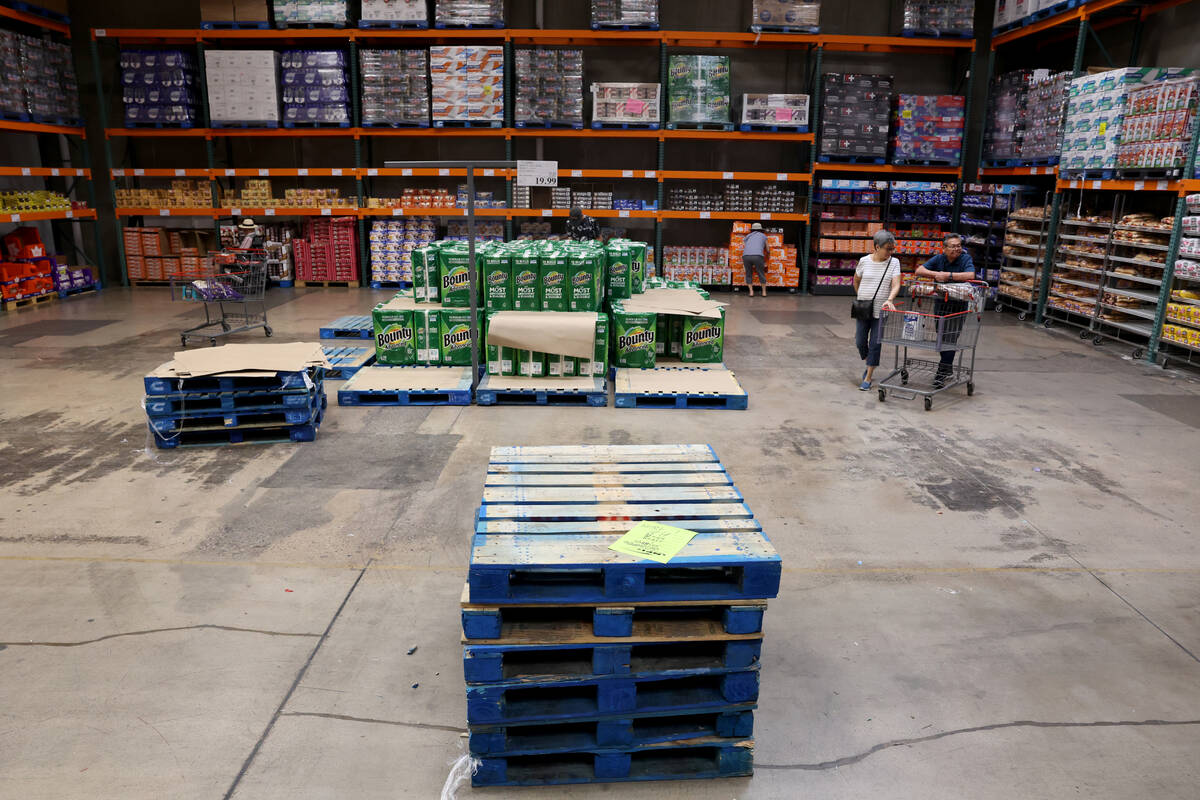 People shop in a area normally filled with toilet paper at Business Costco in Las Vegas Wednesd ...