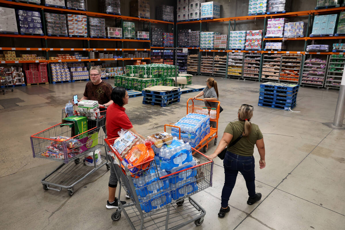 People shop in a area normally filled with toilet paper at Business Costco in Las Vegas Wednesd ...