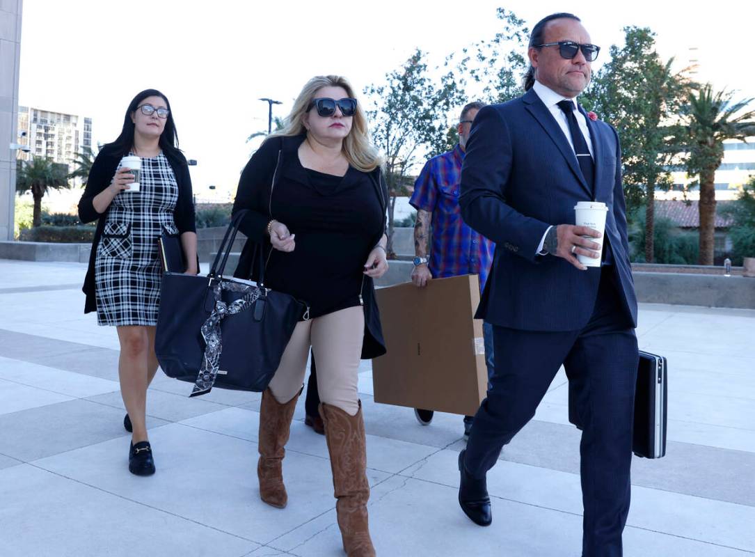 Former Las Vegas City Councilwoman Michele Fiore, center, arrives for her wire fraud trial at t ...