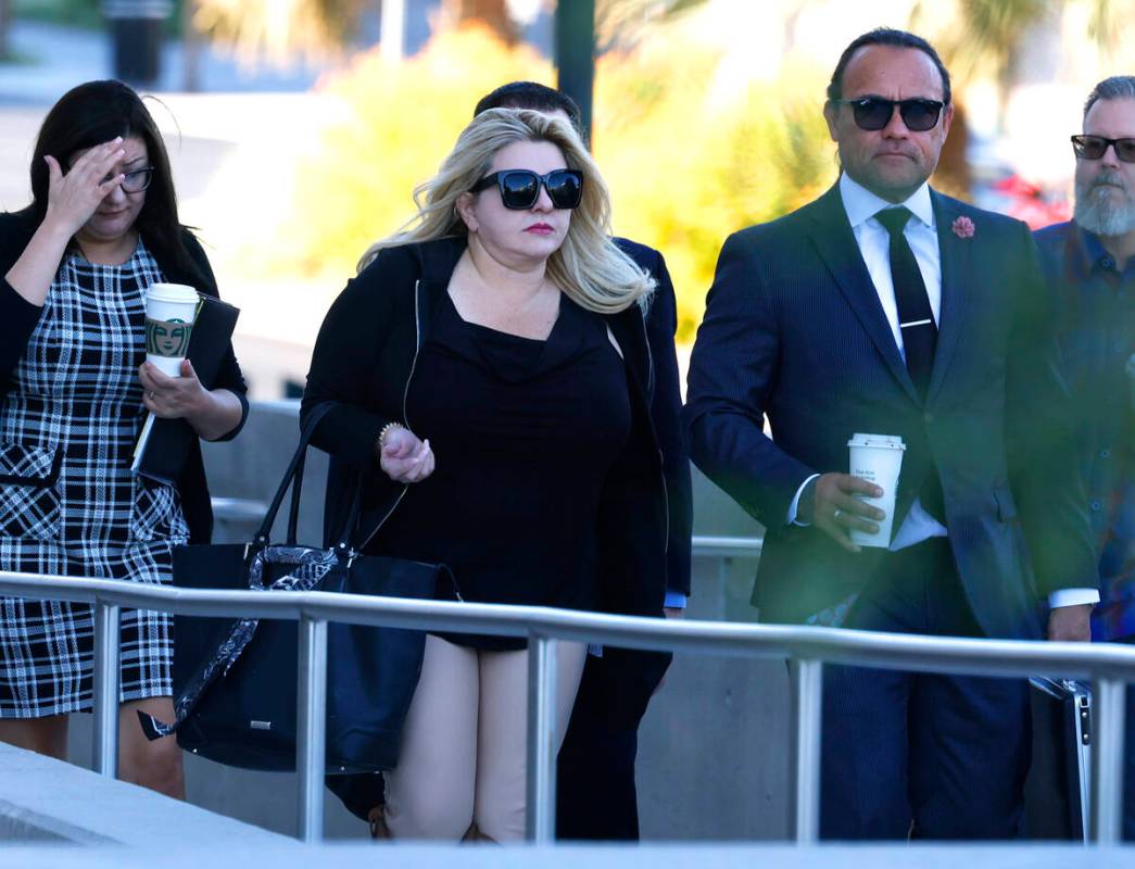 Former Las Vegas City Councilwoman Michele Fiore, center, arrives for her wire fraud trial at t ...