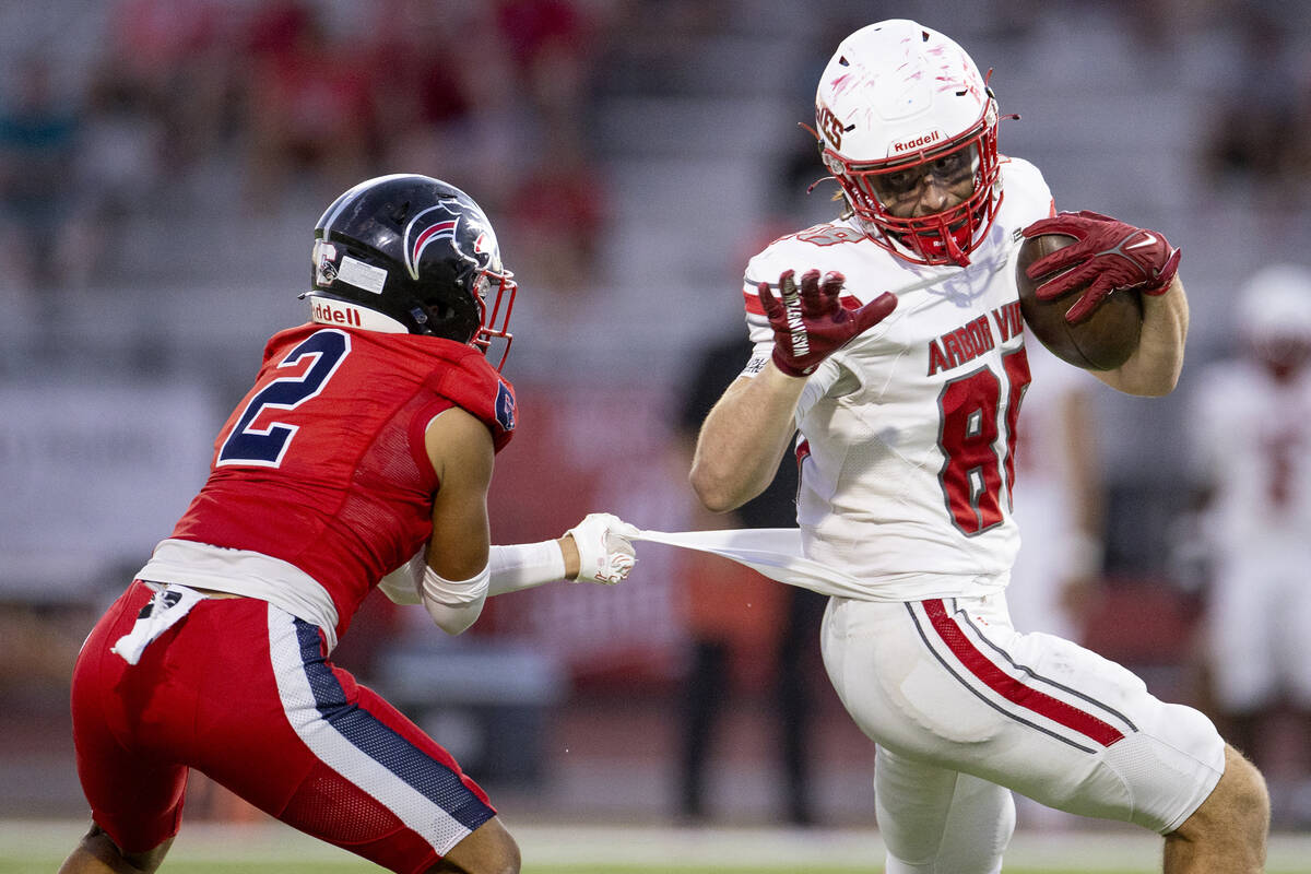 Arbor View tight end Zac Fares (88) avoids Coronado defensive back Isaiah Colbert (2) during th ...