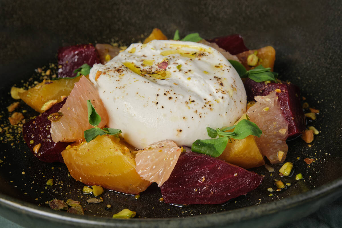 The burrata and beets salad from Zio's, a new Italian restaurant set to open on Oct. 8, 2024, i ...