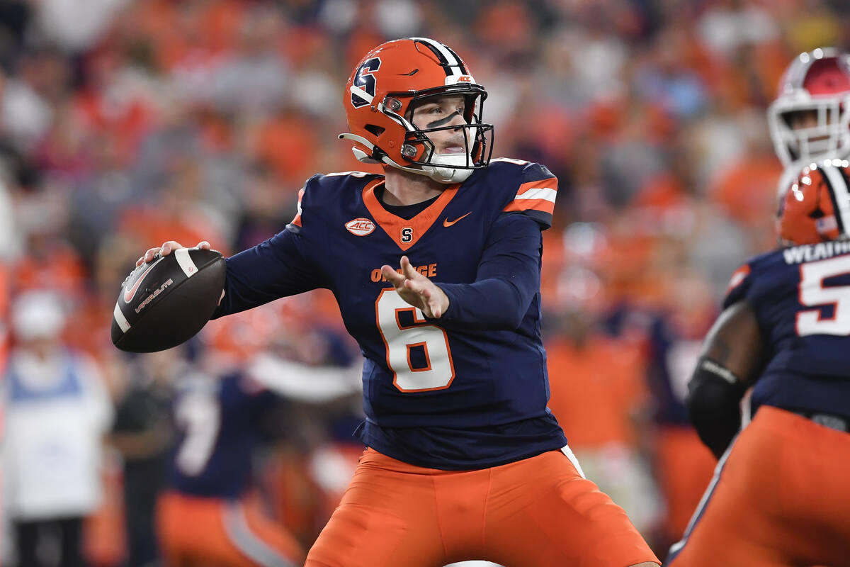 Syracuse quarterback Kyle McCord (6) throws during the first half of an NCAA football game agai ...