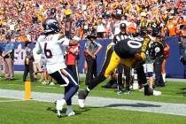 Pittsburgh Steelers tight end Darnell Washington (80) makes a touchdown reception against Denve ...